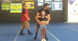Awesome cheer stunt…learning the “One Man”