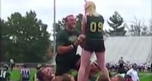 Hoisted boyfriend proposes to cheerleader