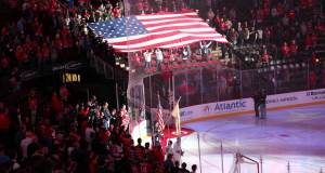Ranger Fan yells out During The National Anthem at a Devils Vs Wild game on Veterans Day at 0:51