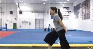 Cheerleading Stunts & Jumps : How to Do Running Round Offs in Cheerleading