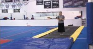 Cheerleading Stunts & Jumps : How to Do a Dive Roll in Cheerleading