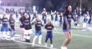 Kim n Chads Kylie cheering behind main cheerleader